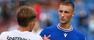 Duel 8. kola Chance Ligy 2025/26: Na snímku zleva liberecký útočník Filip Špatenka a Ondřej Kričfaluši, fotbalista v dresu Baníku