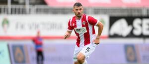 Záložník druholigové Viktorie Žižkov Michael Hönig