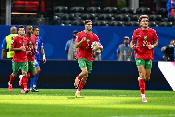 Fotbalisté Maroka se radují z&nbsp;gólu do sítě Haiti